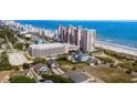 Aerial view of beach front property with ocean and high-rise buildings at 2701 S Ocean Blvd. # 1817, North Myrtle Beach, SC 29582