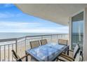 Spacious balcony with ocean views and outdoor furniture at 1625 S Ocean Blvd. # 1305, North Myrtle Beach, SC 29582