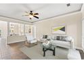 Living room with a sofa, armchair, and coffee table at 84 S Addison Cottage Way # 213, Murrells Inlet, SC 29576