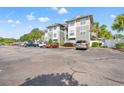 Exterior view of the Culbertson building and parking area at 84 S Addison Cottage Way # 213, Murrells Inlet, SC 29576