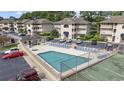 Community pool, hot tub, and tennis court at 4278 Pinehurst Circle # W2, Little River, SC 29566