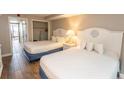 Bedroom with two double beds and easy access to hallway at 6804 N North Ocean Blvd. # 933, Myrtle Beach, SC 29572