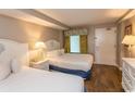 Bedroom with two double beds and access to balcony at 6804 N North Ocean Blvd. # 933, Myrtle Beach, SC 29572