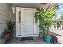 White front door with potted plants at 336 Piedmont Ave., Myrtle Beach, SC 29577
