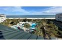 Aerial view of resort pool and beach access at 601 Retreat Beach Circle # 524, Pawleys Island, SC 29585
