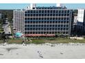 Aerial view of resort near beach with pool and parking at 7100 Ocean Blvd. N # 919, Myrtle Beach, SC 29572