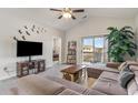 Spacious living room with sectional sofa and access to balcony at 332 Kiskadee Loop # L, Conway, SC 29526