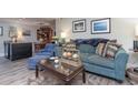Comfortable living room with sofa, chairs, and coffee table at 118 Salt Marsh Circle # 25-I, Pawleys Island, SC 29585