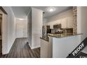Modern kitchen with granite countertops and stainless steel appliances at 4220 Coquina Harbour Dr. # B-11, Little River, SC 29566