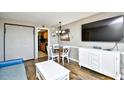 Living area with dining table and kitchen access at 6804 N Ocean Blvd. # 627, Myrtle Beach, SC 29572