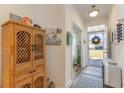 Bright foyer with decorative accents and view to the front door at 662 Sunnyside Dr. # 101, Murrells Inlet, SC 29576