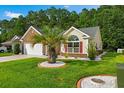 Beautiful home with landscaping and driveway at 544 Running Deer Trail, Myrtle Beach, SC 29588