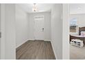 Light and airy entryway with view to living area at 508 Shellbark Dr., Longs, SC 29568