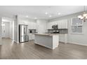Modern kitchen with stainless steel appliances and an island at 508 Shellbark Dr., Longs, SC 29568