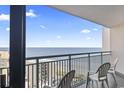 Balcony with ocean view and chairs at 205 N 74Th Ave. N # 1106, Myrtle Beach, SC 29572