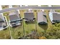 Aerial view of houses, yards, and a neighborhood street at 240 Goose Pond Dr., Myrtle Beach, SC 29579