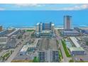 Aerial view showcasing resort, beach, and ocean at 1501 S Ocean Blvd. # 1038, Myrtle Beach, SC 29577