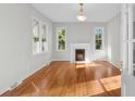 Spacious living room with hardwood floors and fireplace at 432 N Smith Rd., Mullins, SC 29574