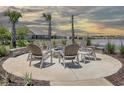 Community fire pit with seating, perfect for gatherings at 305 Hawks Run Dr., Calabash, NC 28467