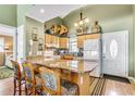 Well-equipped kitchen featuring granite countertops and ample cabinetry at 551 S Waccamaw Dr., Garden City Beach, SC 29576