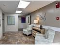 Building lobby with seating area and artwork at 5001 Little River Rd. # E115, Myrtle Beach, SC 29577