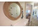 Bright entryway with mirror, console table, and bedroom view at 4800 S Ocean Blvd. # 1522, North Myrtle Beach, SC 29582