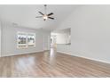 Spacious living room with hardwood floors and access to patio at 1006 Stump Rd., Conway, SC 29526