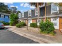 Two brick townhouses with grey roofs at 4505 N Kings Hwy. # C3, Myrtle Beach, SC 29577
