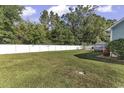 Spacious backyard with green lawn and privacy fence at 153 Garden Ave., Georgetown, SC 29440