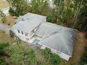 House with pool and private backyard, surrounded by trees at 1065 Wigeon Dr., Conway, SC 29526