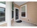 Front entry with glass door and sidelights, leading into the home at 1562 Palmina Loop # B, Myrtle Beach, SC 29588