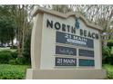 North Beach sign with business information at 100 North Beach Blvd. # 311, North Myrtle Beach, SC 29582
