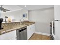 Galley kitchen with granite countertops and stainless steel appliances at 2001 S Ocean Blvd. # 905, Myrtle Beach, SC 29577
