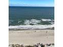 Stunning panoramic view of the ocean and beach from a high-rise balcony at 2201 S Ocean Blvd. # 1404, Myrtle Beach, SC 29577