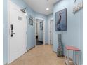 Condo entryway with coastal decor and hallway access at 300 N Ocean Blvd. # 128, North Myrtle Beach, SC 29582