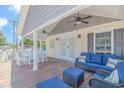 Covered back porch with seating and outdoor dining area at 6001 - 8016 S Kings Hwy., Myrtle Beach, SC 29575