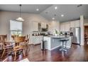 Eat-in kitchen with island, stainless steel appliances, and hardwood floors at 190 Campania St., Myrtle Beach, SC 29579