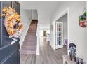 Bright and spacious entryway with stairs and French doors at 438 Archer Ct., Conway, SC 29526