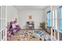 Bright playroom featuring a colorful rug and toys at 438 Archer Ct., Conway, SC 29526