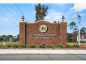 Colonial Charters Golf Community sign at entrance at 493 Shellbank Dr. # 2-B, Longs, SC 29568