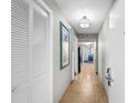 Condo hallway with tiled floor and white doors at 5200 N Ocean Blvd. # 1231, Myrtle Beach, SC 29577