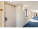 Interior hallway with condo unit door at 5200 N Ocean Blvd. # 1231, Myrtle Beach, SC 29577