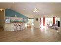 Open living space with kitchen, breakfast nook, and sunroom at 172 Collins Glen Dr., Murrells Inlet, SC 29576