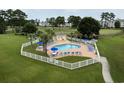 Community pool and surrounding grounds viewed from above at 4893 Magnolia Pointe Ln. # 103, Myrtle Beach, SC 29577