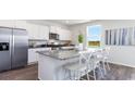 Modern kitchen with stainless steel appliances and an island at 510 Firouz Dr, Longs, SC 29568