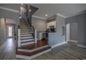 Elegant staircase with wooden steps and wrought iron railing at 845 Waterton Ave., Myrtle Beach, SC 29579