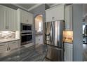Modern kitchen featuring stainless steel appliances and granite countertops at 845 Waterton Ave., Myrtle Beach, SC 29579