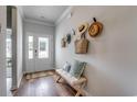 Bright and airy entryway with a bench and storage at 119 Arrow Wood Dr, Conway, SC 29526