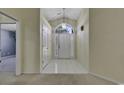 Bright entryway with tiled floor and arched window at 4542 Mandi Ave., Little River, SC 29566
