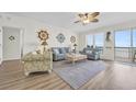 Relaxing living room with ocean views and comfortable seating at 8500 Margate Circle # 1104, Myrtle Beach, SC 29572